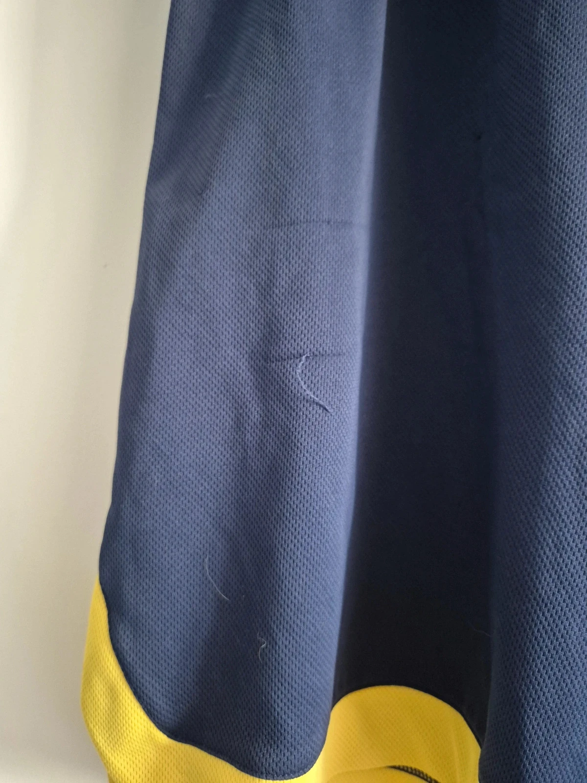 Short bleu et jaune décathlon S – photo 4